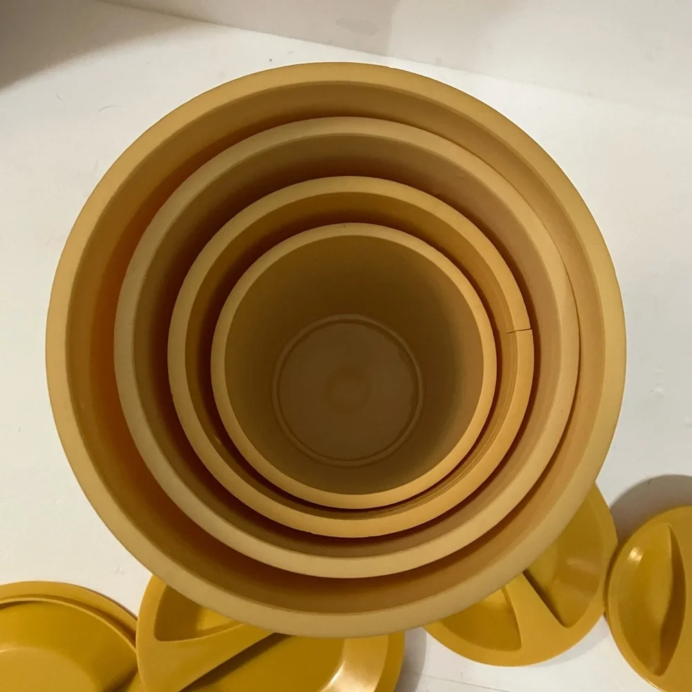 Vintage Set of 4 Nesting Kitchen Canisters Harvest Gold Plastic with Yellow Lids